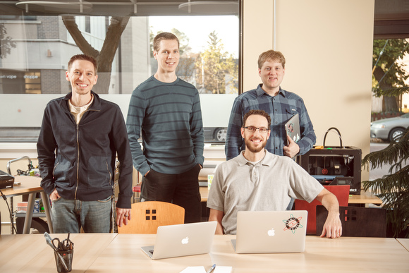 Atomic Object's Quell software team. From left, Jordan Schaenzle, Brian Vanderwal, Patrick Bacon, and Scott Vokes. Designers Kim Wolting and Brittany Hunter and contractor Kevin White also contributed.