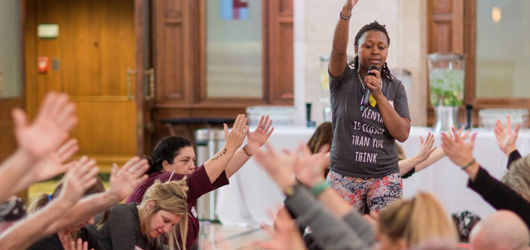 Leading a yoga class at the City Flats Ballroom, Embody GR hosts free community yoga, as do a number of other community organizations. 