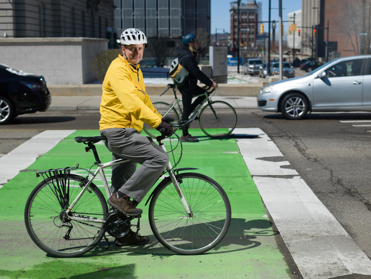 Green boxes at intersections help riders move into turn lanes and encourage better safety.