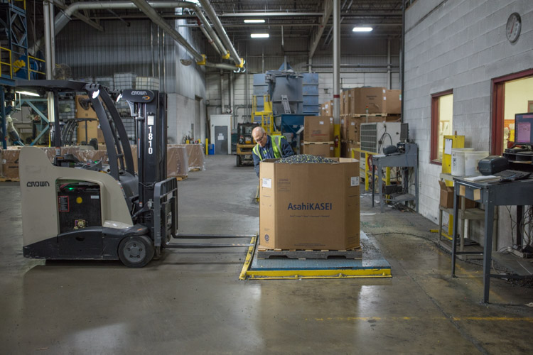 Recycled plastics are carefully weighed before shipping. 