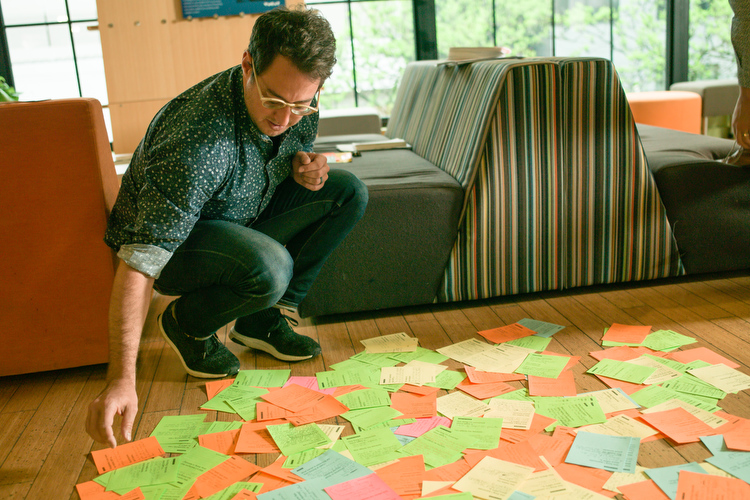 Adam Weiler sorts through responses from the meetings.