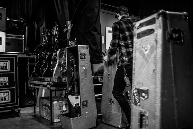 Guitars are removed from cases and laid out at the Intersection for a performance by Rival Sons. 