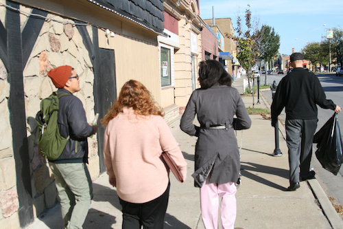 The members of the Steering Committee walk along the South Division Corridor
