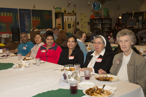 Sisters Donna Jean Thelen and Sister Dorena Gonzalez sit next to Veronica Quintino-Aranda, and the Maldonado family (right to left: Elizabeth, Josefina and Ruben) during the meal. 