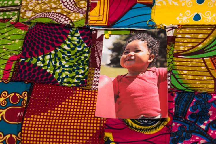 A photo of Damian on Tacitus Bailey-Yabani's colorful office wall in Muskegon. Photo by Jenna Swartz