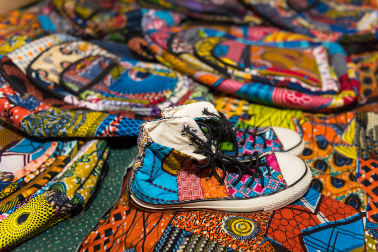 Ghanaian shoes and backpacks are sold at Abeshi. Photo by Jenna Swartz