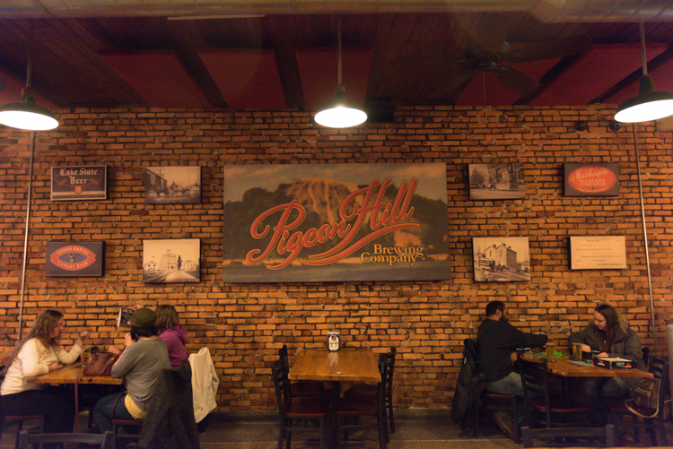 Customers in Pigeon Hill's taproom. Photo by Jenna Swartz