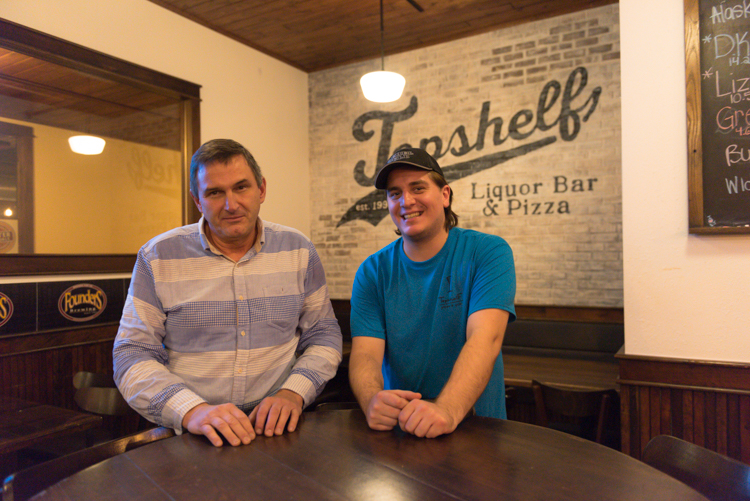 Topshelf owner Jim Noel, left, and his son, Alec Cargill, who manages the bar and restaurant. Photo by Jenna Swartz