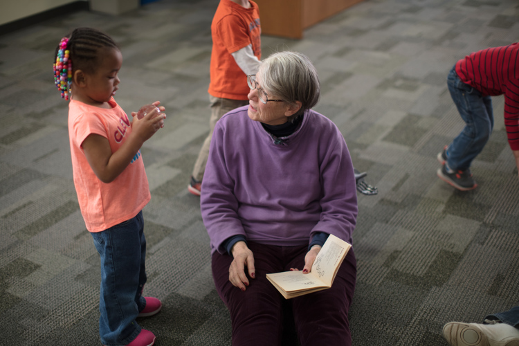 Judith Buchman spends time with children during a senior day program with Bethlehem Lutheran Intergenerational Center. 