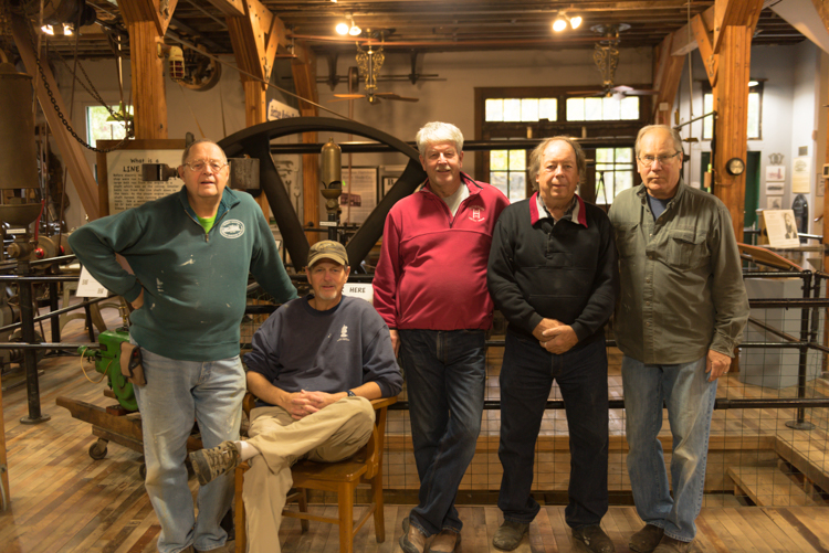 Muskegon Heritage Museum Director Allan Dake, center, is joined by volunteers Dick Didrickson, left, Bob Harvey, Roger Wiitanen, and Don Niskanen.