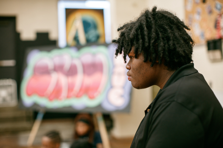 Students learn about the art of graffiti.