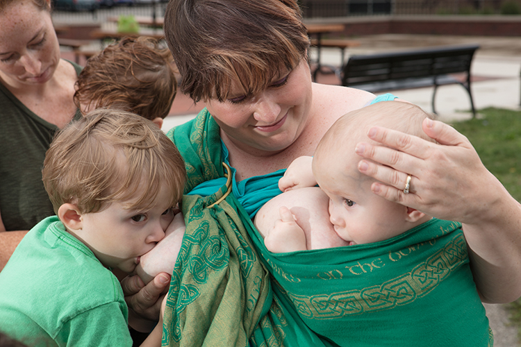 Erin Wiseman-Parkin feeds her children, James and Rory.