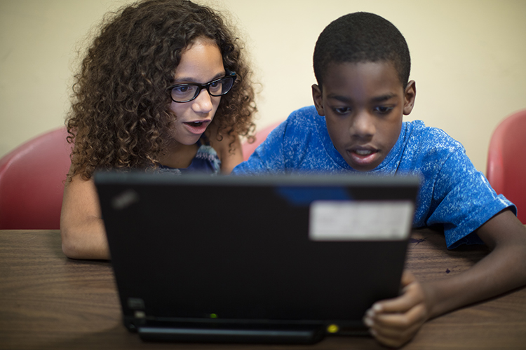 Students learn computer programing at Loop Coding Center.