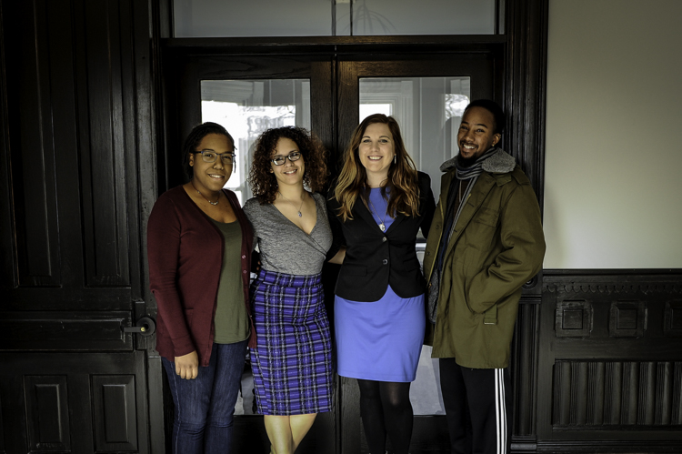 From Right to Left, Ja-Quari Moore-Bass: Youth Alumni and House Mentor, Lauren Van Keulen: Co-Executive Director, Kayla Morgan: Community Liaison and House Mentor, Kendra Avila: Administrative Assistant.