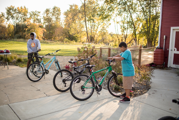 Kids gather for a group ride. 