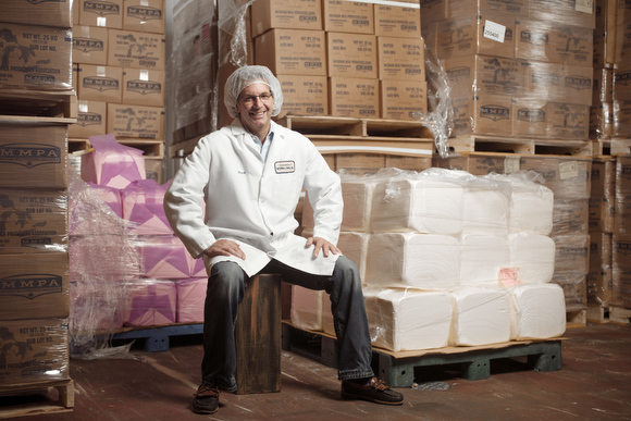 Mark Peters in the fridge with hundreds of pounds of butter.