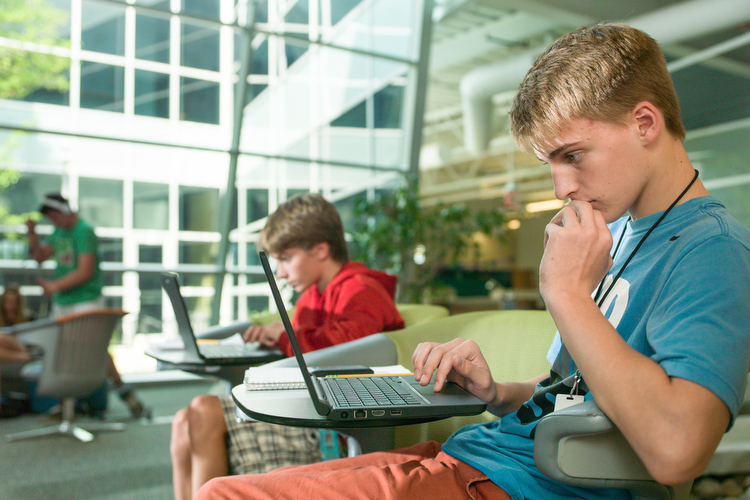 Students at iCademy in Zeeland study online.