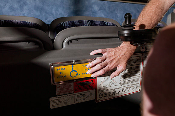 Accessible buttons to signal the driver on buses are small but essential details for mobility.