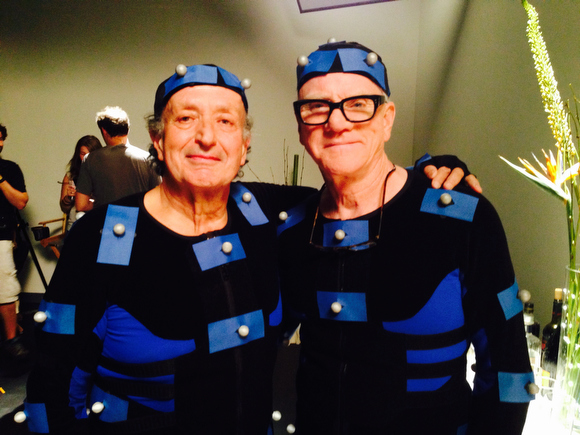 Bernard Uzan, left, with Malcom McDowell, right.