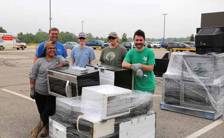 Gentex employees volunteer at the company's annual electronics recycling event.