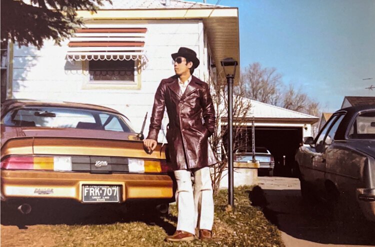 Jennifer Pham’s grandfather, Xinh Van Pham, poses proudly with his new car in the 980s.