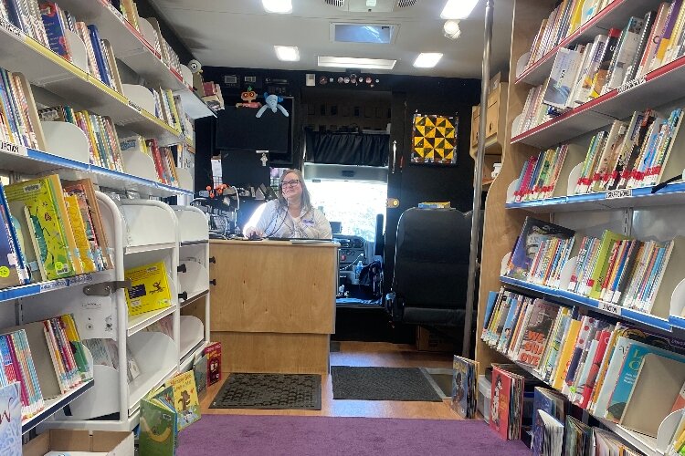 Librarian Joyanne Huston-Swanson inside the KDL bookmobile.