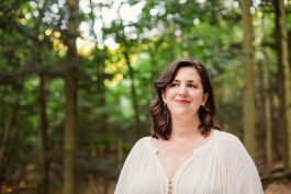 Cait West, author and co-host of the podcast "Survivors Discuss."