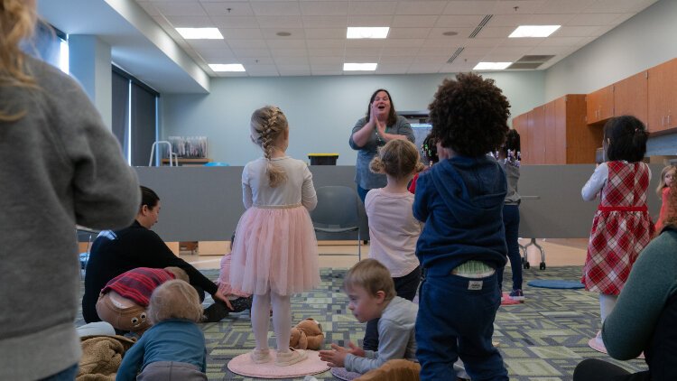 Books aren't the only thing essential to a  fun storytime at the library. Music and movement and key components, too.