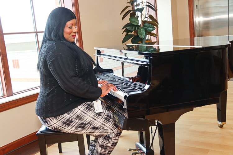 The former tenant left a piano behind for the residents who, like Bri, enjoy this opportunity to brush up on or learn a new skill.