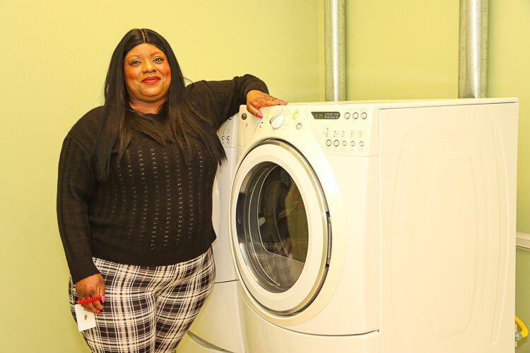 The Complex Care Housing facility offers many age-friendly amenities like same-floor access to laundry machines.