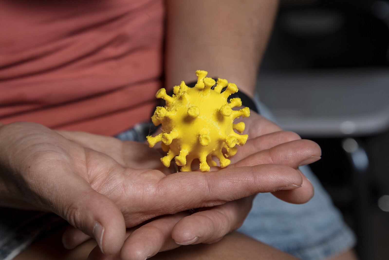 Jessica Dejong showcasing her model of the coronavirus in her science classroom.