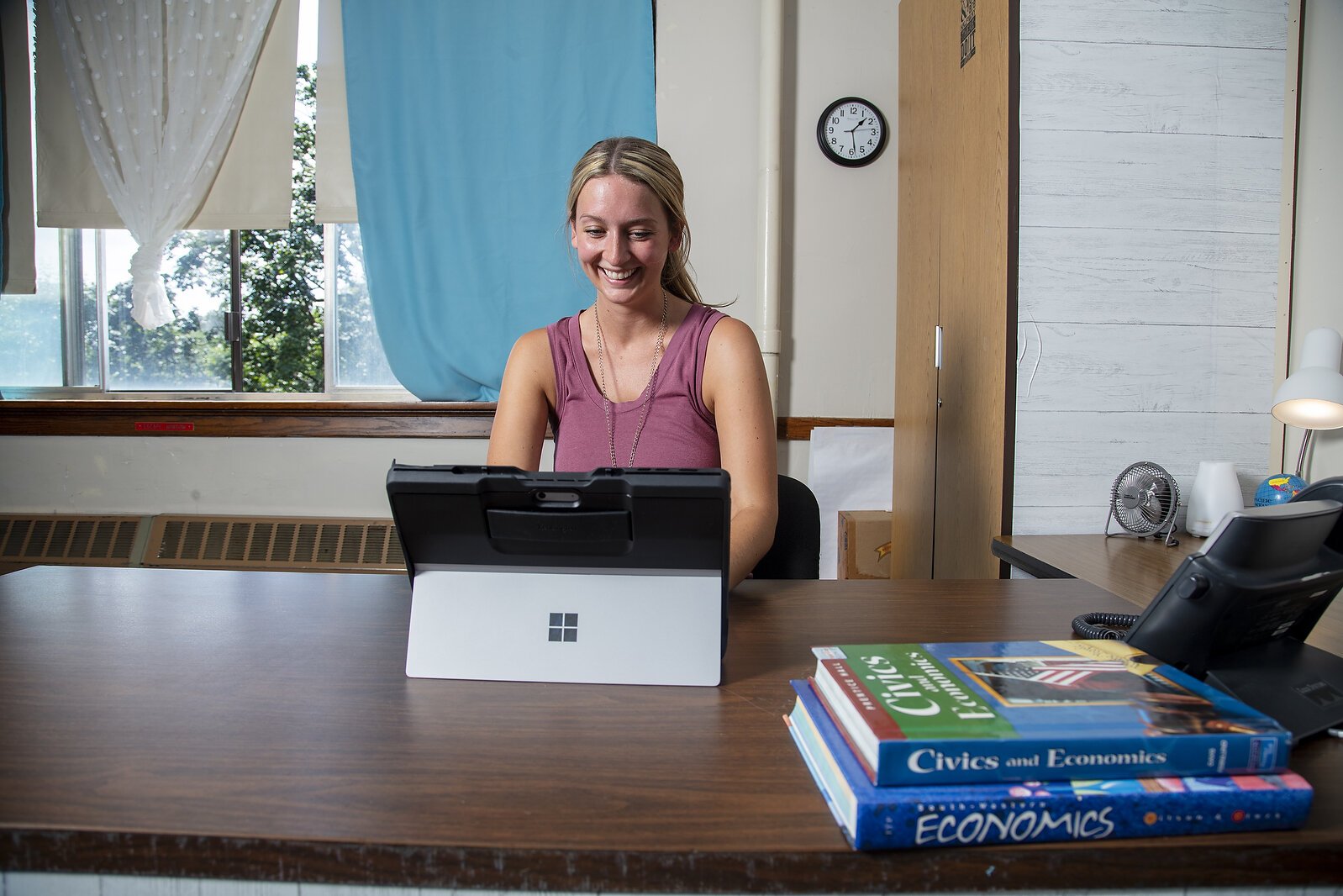 Nicolette Johnston at her classroom desk preparing for school to start.