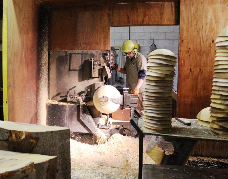 The Holland Bowl Mill turns out an average of 800 to 1,000 wooden bowls per week.