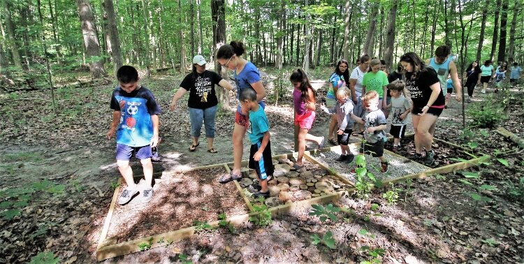 The Grand River Park's sensory trail features a walk-through station. (Photo by Mike Lozon)