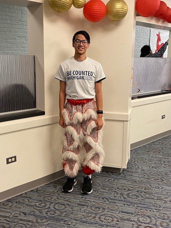 Duy Nguyen of The Asian Community Outreach Census outreach team at GVSU’s Lunar New Year Festival in early 2020.