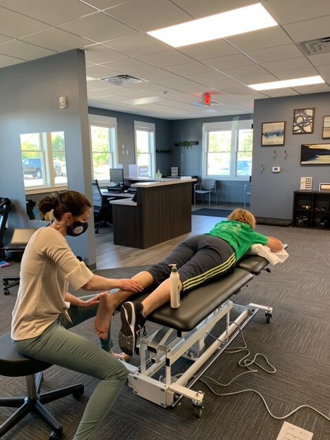 Physical therapist Rebekah VanZegeren treats a patient.