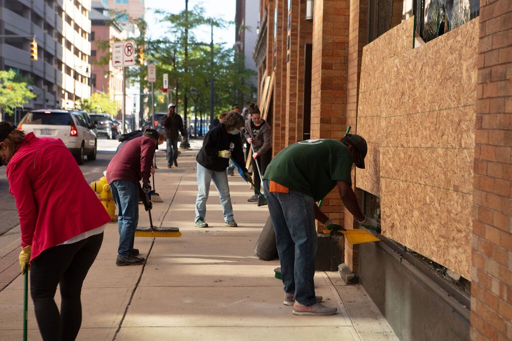 Windows are boarded on Louis St.