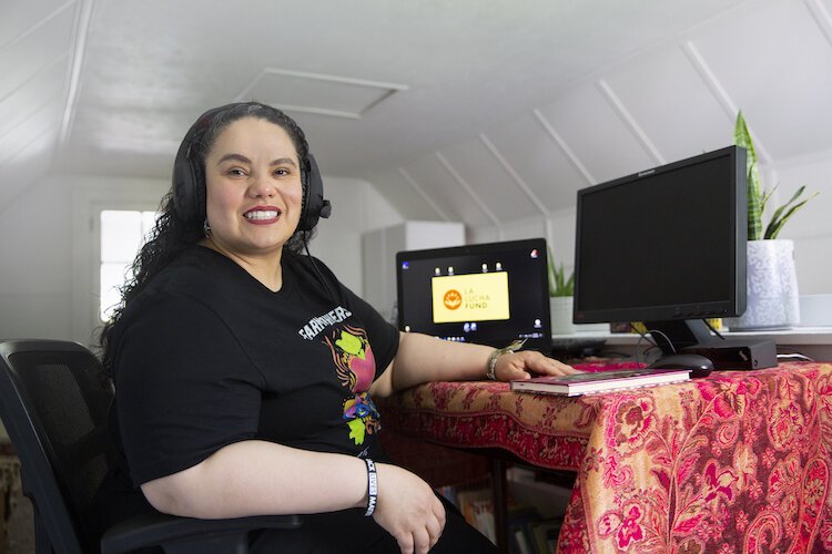 Lorena Aguayo-Marquez of Movimiento Cosecha GR reviews La Lucha Fund applications.