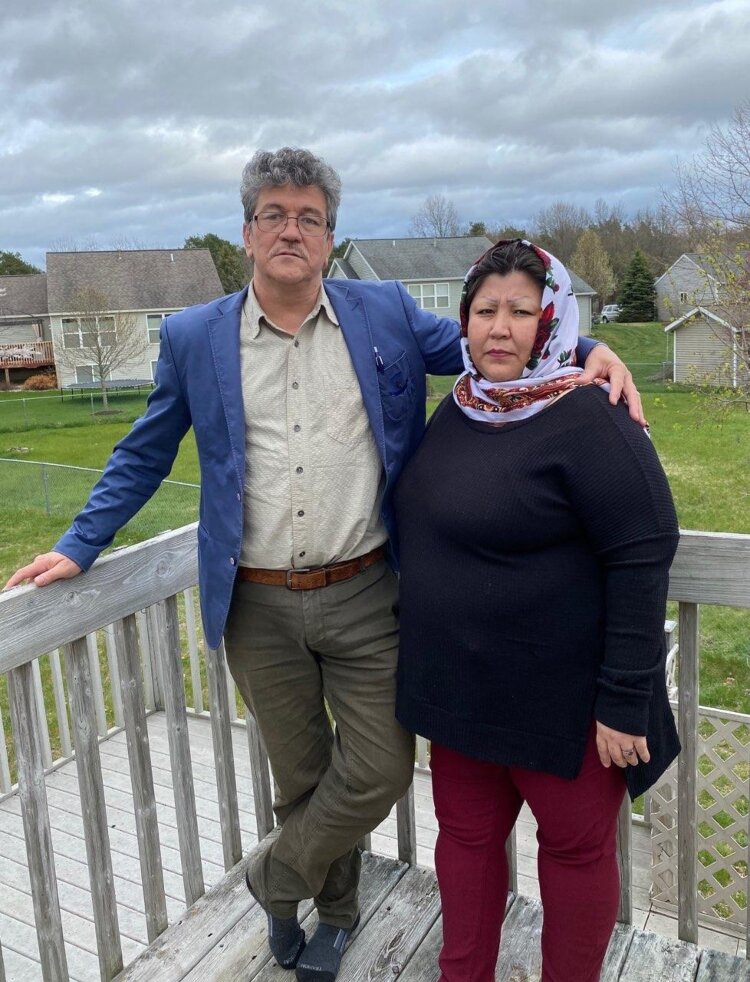 Ebrahim Mohammad Eshaq with his wife, Farzana Saadat,  at their Holland home. 