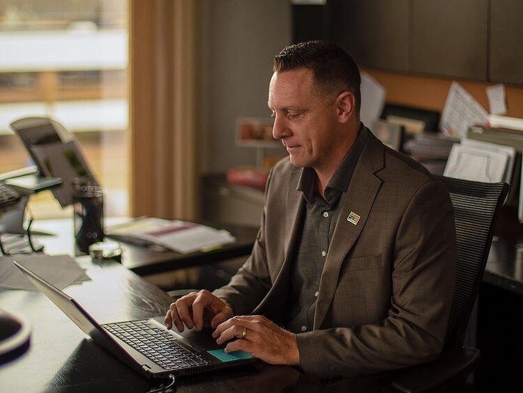 Patrick Moran in his office in Holland. Photo by Matthew J. Huizenga