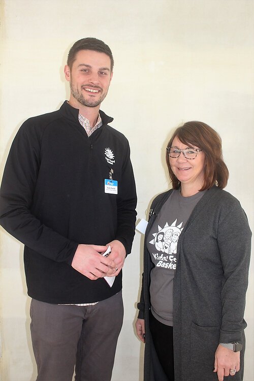 The Kids' Food Basket team includes (left) Austin Roelofs, director of program operations and Julie Vangessel, director of community engagement. Photograph by Bev Berens.