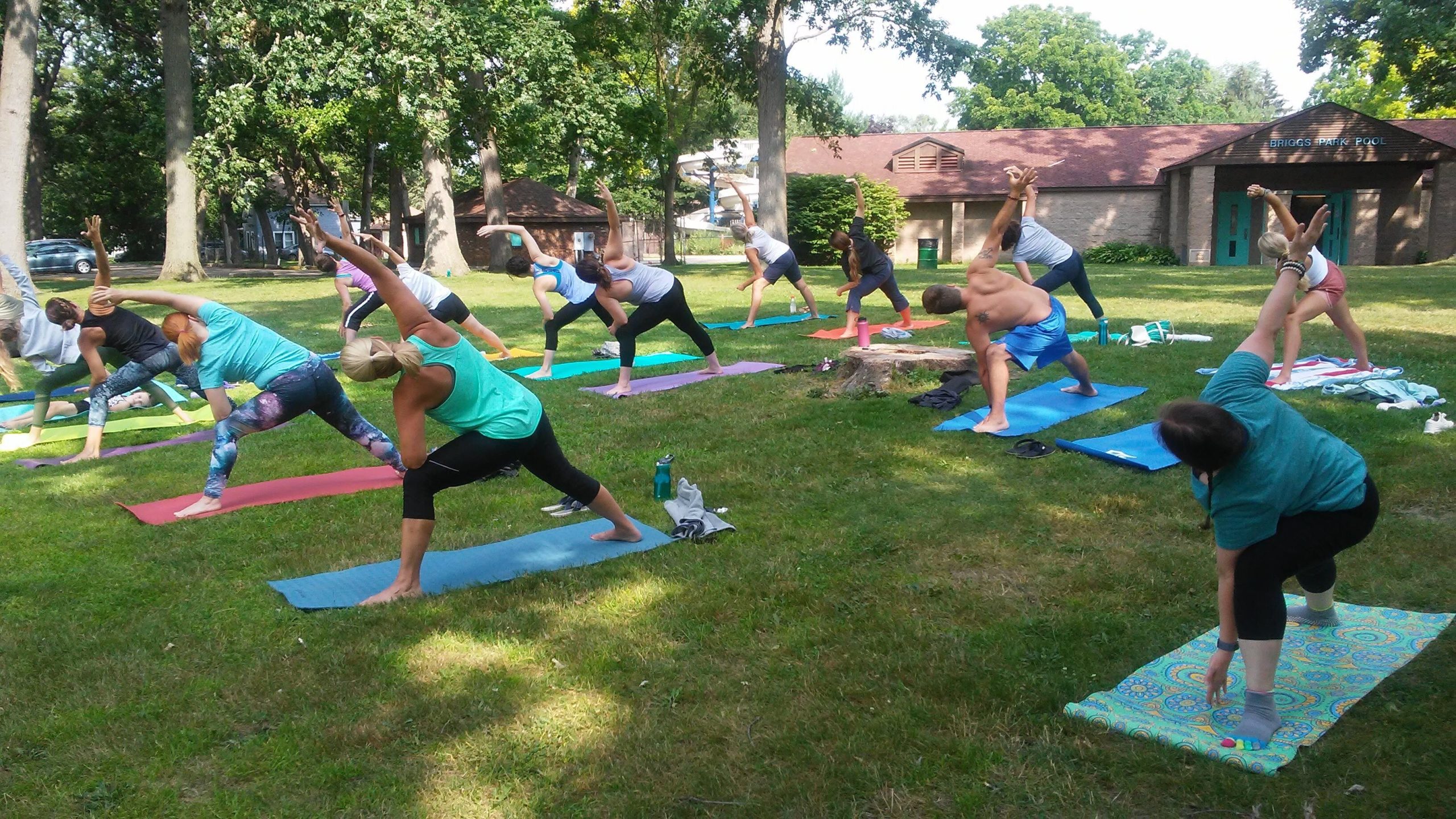 Flip Dog hosts weekly outdoor yoga at Briggs Park.