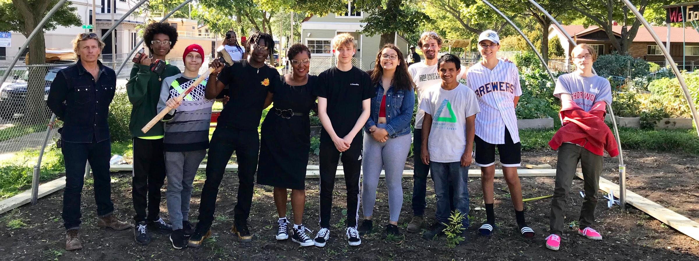 Community residents celebrating progress