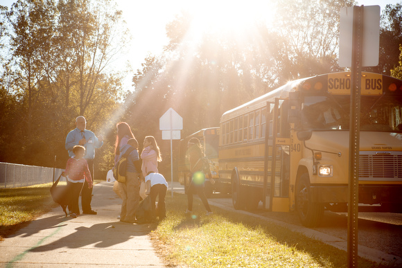 Students leave the bus for the C.A. Frost Environmental Science Academy.