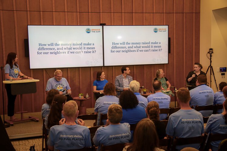 Danielle Sheffield-Laporte (far left), Board Chair at Feeding America West Michigan, led the kick-off of Bridge the Gap, welcoming a panel of food systems speakers.